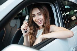 Woman sitting in a car hire at Gran Canaria airport